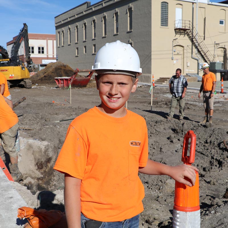 Young boy at a construction zone