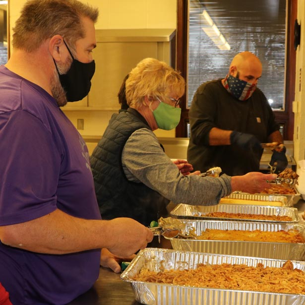 Group serving food at a parks and recreation event